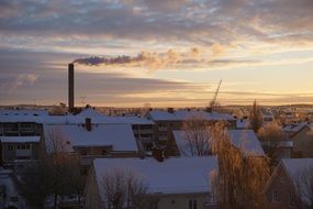 landscape of snowy roofs of houses