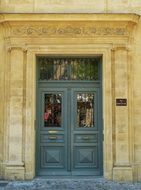 wooden door of Hôtel de Meyronnet Saint-Marc, france, provence