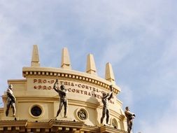 sculptures on the roof of a building in sardinia