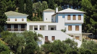 white villa among trees, greece, skiathos