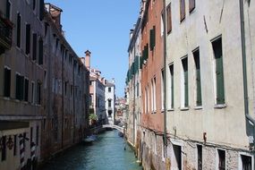 Landscape of canal among old houses in venice