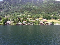 distant view of houses on a lake in austria