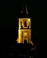 Illuminated Church Steeple at night