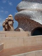 sculpture under blue sky in barcelona