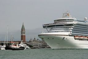 luxury cruise Ship on water in front of City, italy, Venice