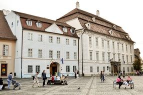 architecture of the square with the people of a european city