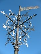 weathervane on a building tower