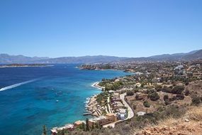 rocky coast near the ocean with villas