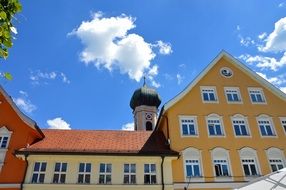 tower behind city buildings