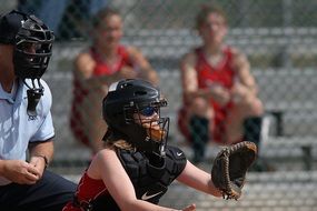 softball in black masks