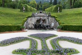 bronze neptune as a fountain in the park