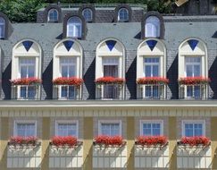 hotel with balconies on the facade close-up