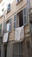 duvet cover drying in the old downtown