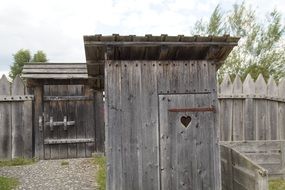 wooden toilet on the street