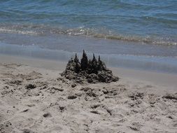 sand castle near the water