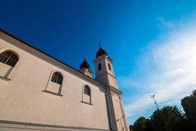 church with a tower on a background of blue sky