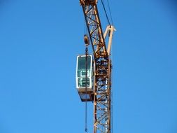 cab on a metal crane