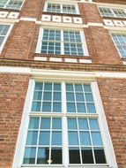 tall lattice Windows in Brick wall