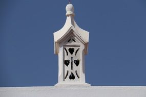 white chimney on a roof