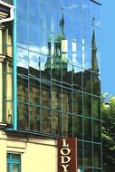 glass panels on the facade of the building