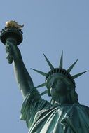 statue of liberty with torch in hand