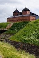 Finnish castle on a green hill