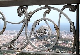 top view of city through wrought iron Fence