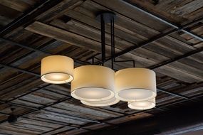 modern lamps on a wooden ceiling