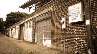 old brick garages in boston in monochrome image