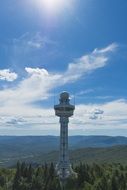distant view of a modern tower under the bright sun