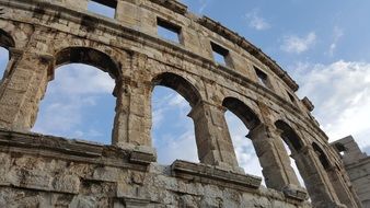 ruins of an ancient amphitheater in Pula