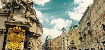 Facades of buildings on a city street in Austria