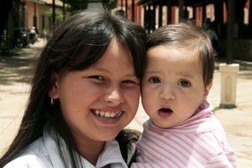 girl with a child in honduras
