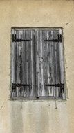 old weathered window shutters in Pyla