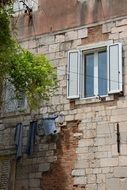 weathered facade with windows