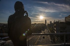dark silhouette on balcony at dusk Cityscape, Artwork