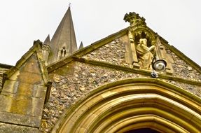 church with a golden facade in Redhill town