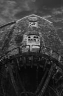 aged stone Building of Skenfrith corn Mill, detail, uk, wales