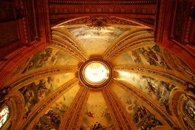 domed ceiling in the church with pictures