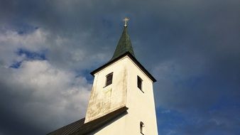 cross on the spire on the tower in Lackenhof