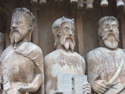 Statues on the medieval catholic Church facade, spain, tarragona