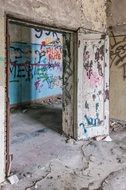 graffiti on the walls of an abandoned building