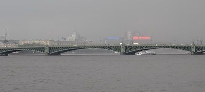 landscape of bridge over the river in rainy weather