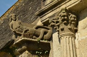 female figure at a church in Sizun, France
