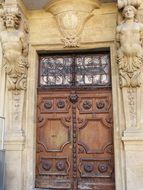 entrance of an ancient house with atlants