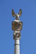 historic pillar with a sculpture in padua