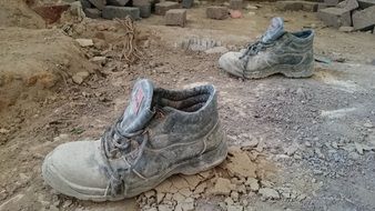 Boots in Mud Cement