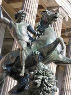 The statue is a Monument In Berlin, the warrior on horseback with a spear