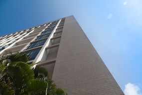 high building against the blue sky