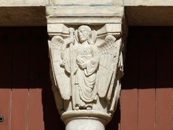 angel relief on the cathedral in Arles